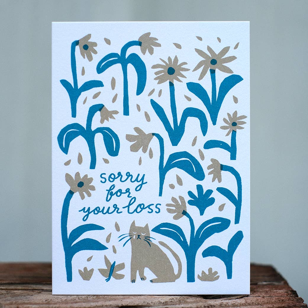 Card with floral design and 'sorry for your loss' text on a white background