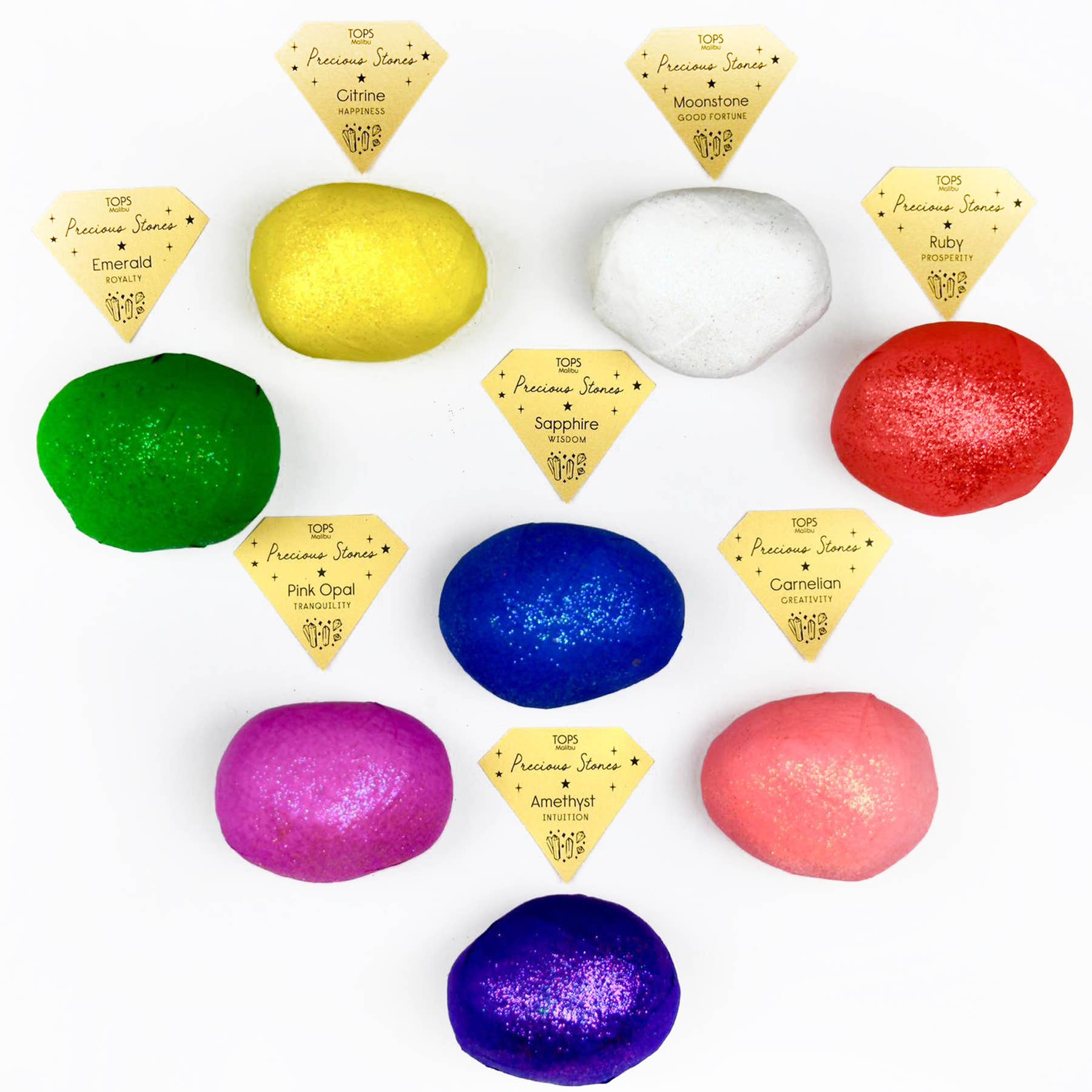 Colorful surprise balls with diamond-shaped labels on a white background