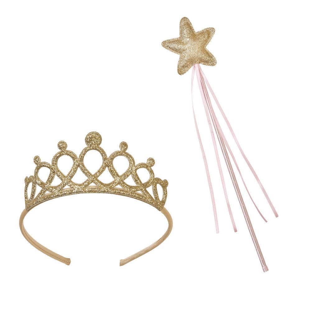 Gold tiara and star wand on a white background