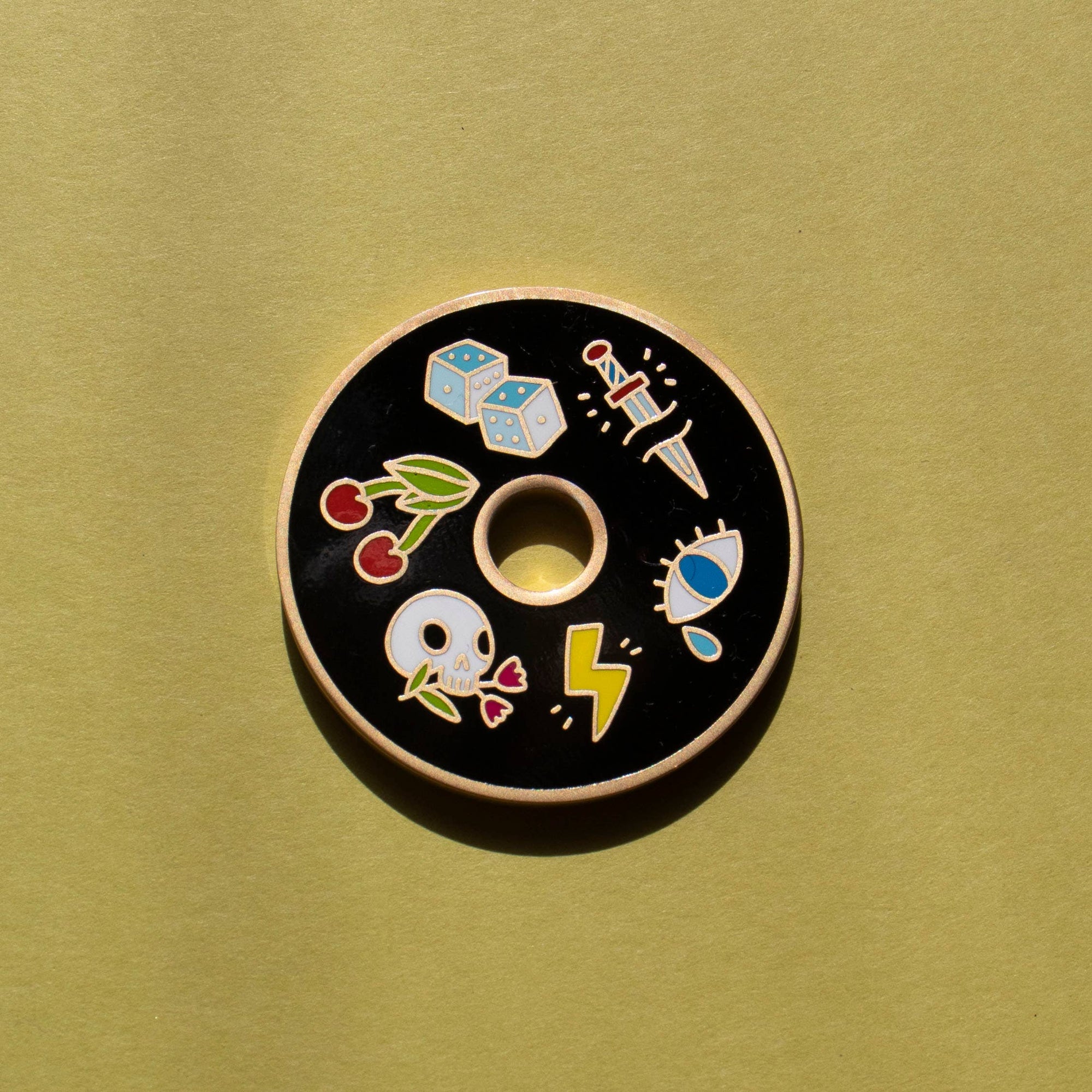 Circular black badge with colorful illustrations on a green background