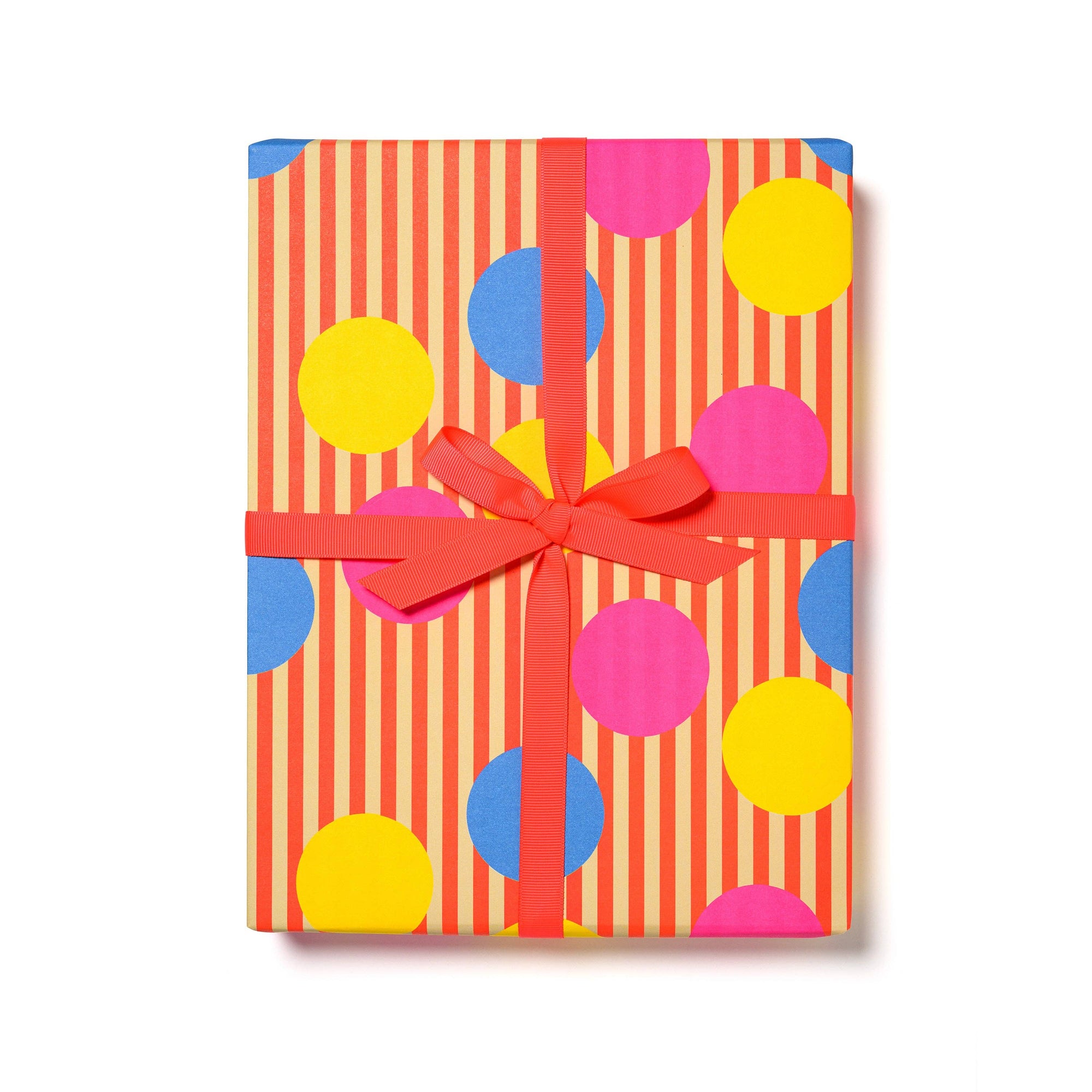 Gift box with colorful polka dot pattern and a red ribbon on a white background