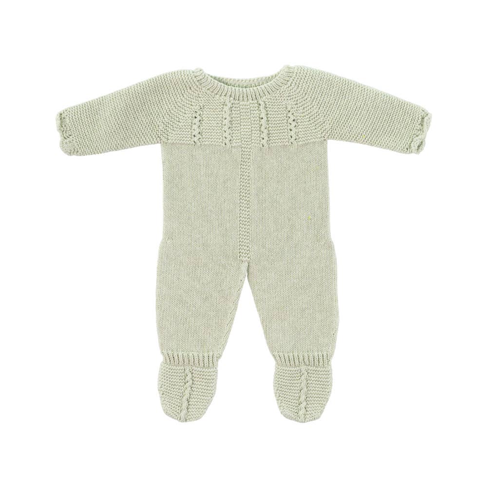 Knitted doll romper suit on a white background