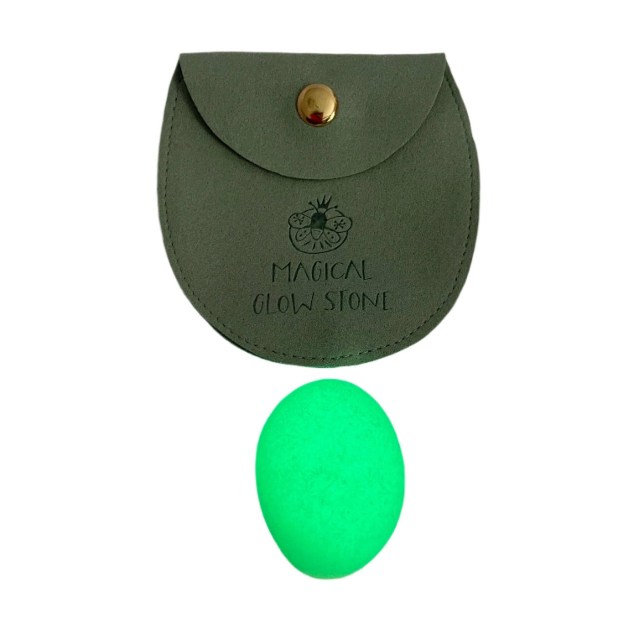 Green glowing stone with a matching pouch labeled 'Magical Glow Stone' on a white background