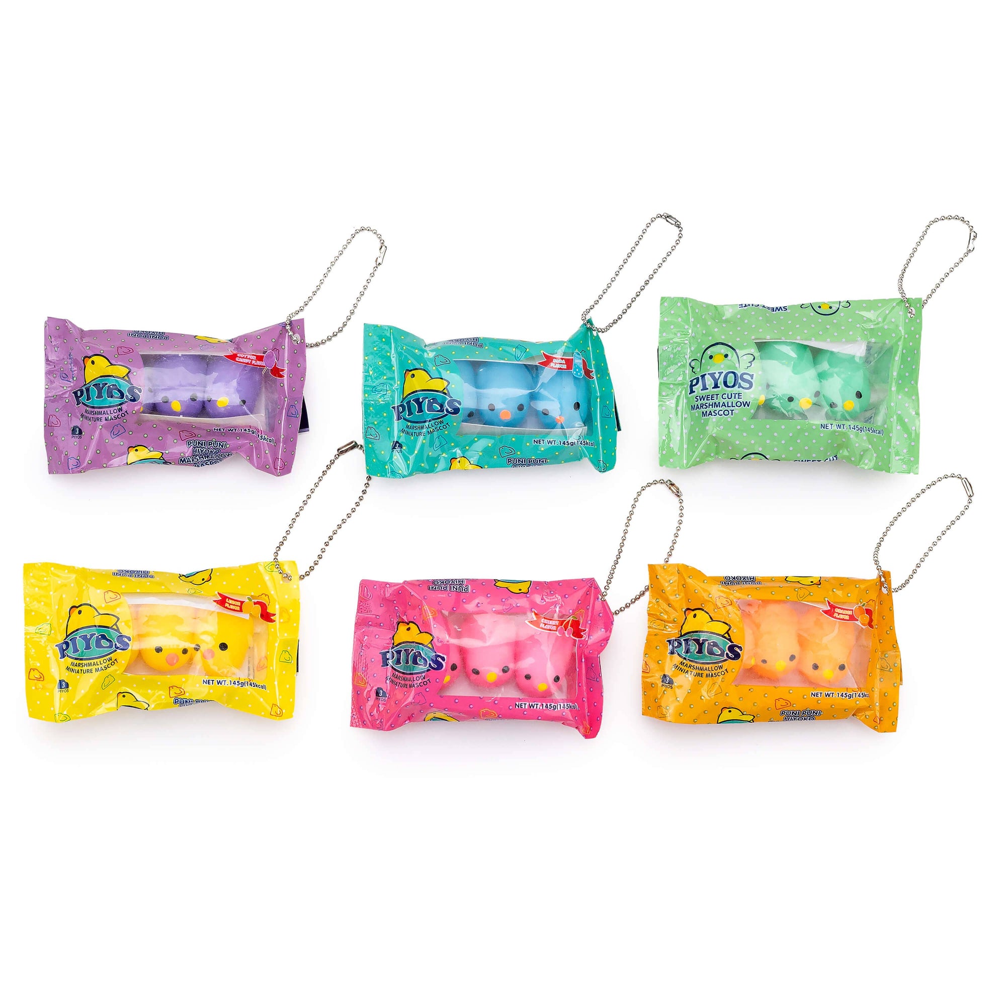 Set of colorful chick candy toy packages with chick characters on a white background