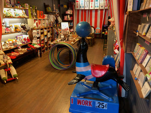 This is a picture of interier of store showing our seal ride and some hula hoops