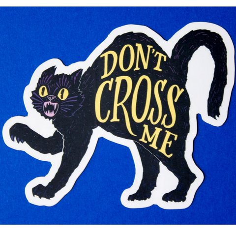 sticker with angry black cat and yellow text