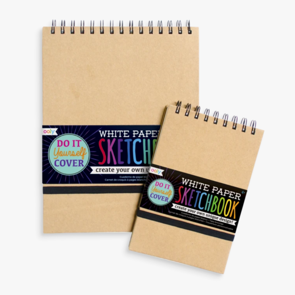 two different sized sketchbooks with binding over them