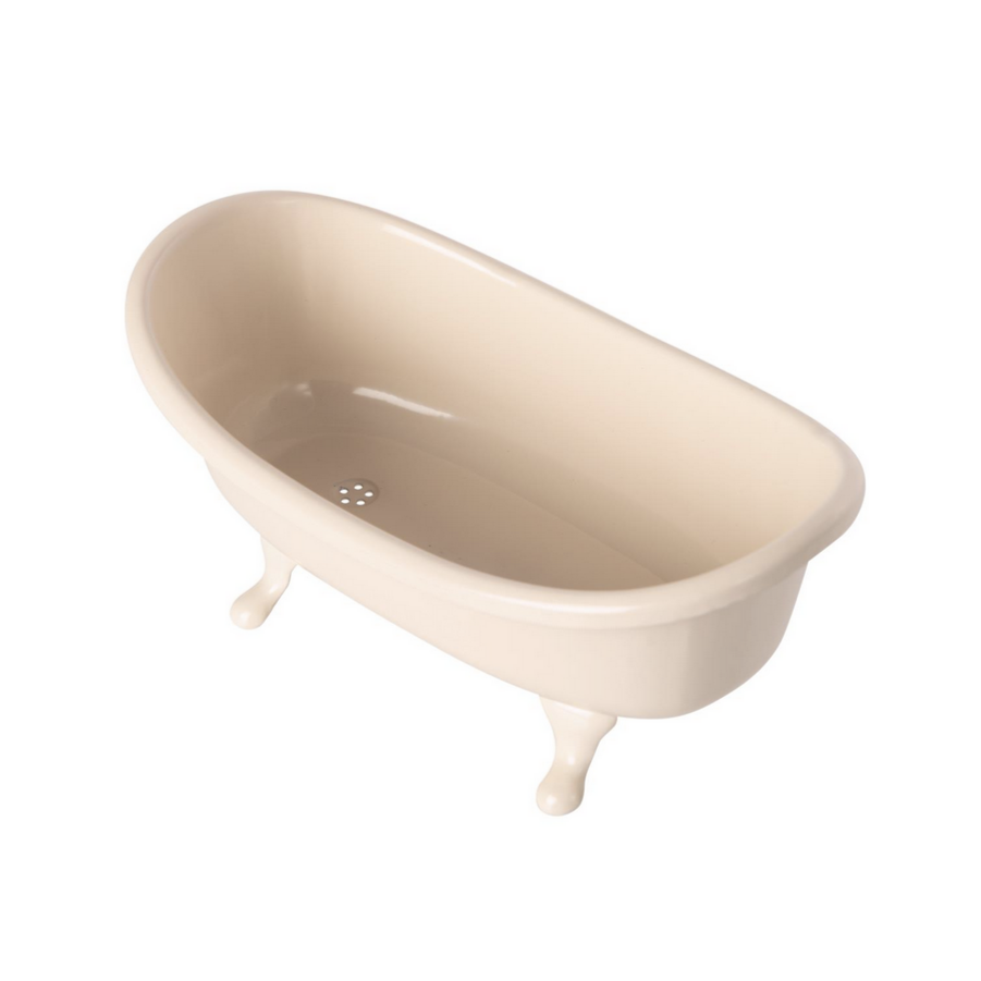 top view of white claw foot bathtub showing drain