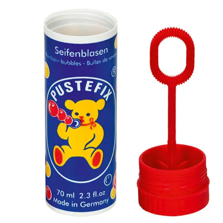 this is a picture of the bubble tube opened. You can see that the wand is attached to the lid.open bottle of bubbles with lid off showing wand attached to lid