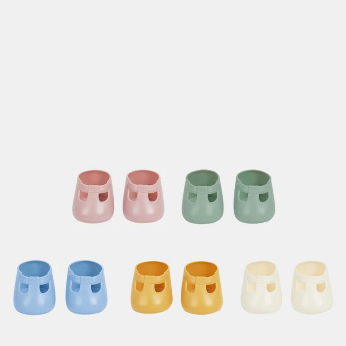 five pairs of different color, plastic doll shoes