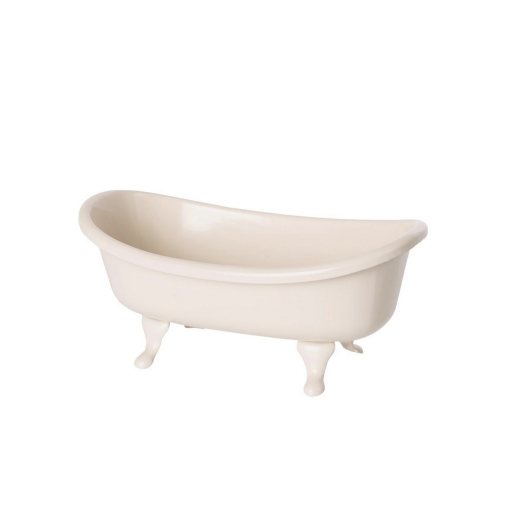 side view of white claw foot bathtub