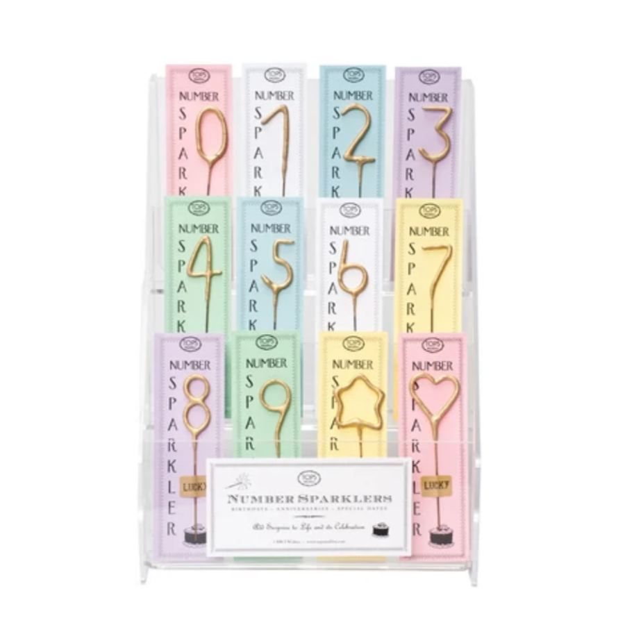 THis is a picture of the mini gold sparklers 1-9 and a heart in star in it's pastel packaging within a display.