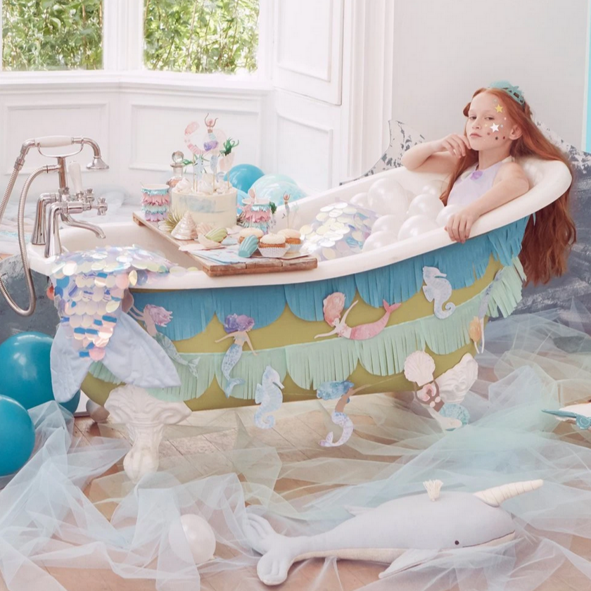 kids bathroom filled with mermaid party decorations