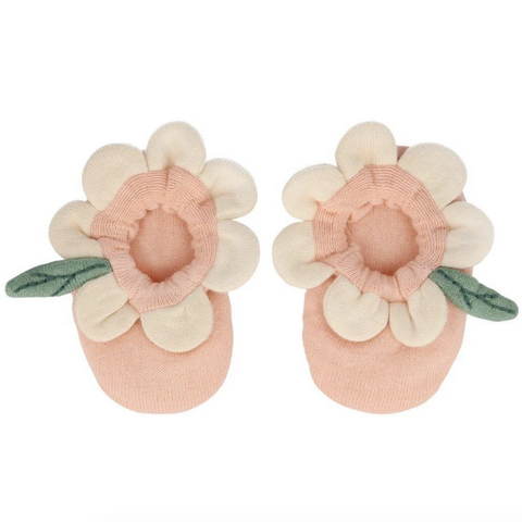 baby booties shaped like peach colored flowers