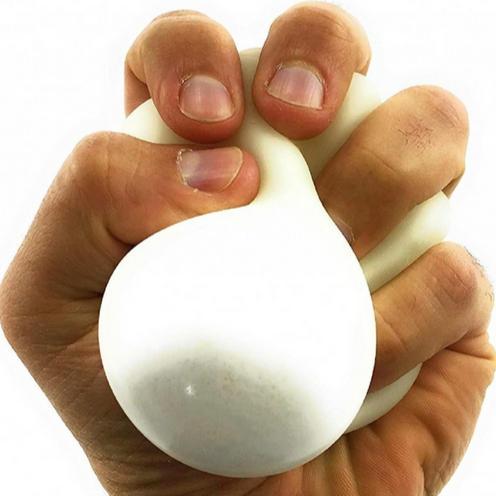 ball of nee doh being squeezed by a hand