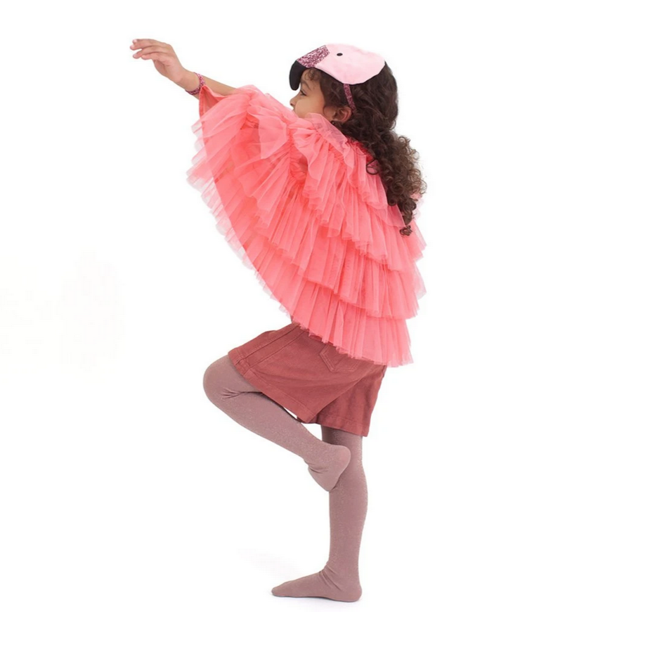Child modeling a pink flamingo dress-up kit with a headpiece and layered tulle winged cape.