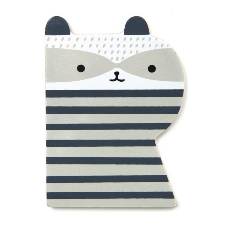 It is the letter R. It is a thin piece of wood, shades of grey and looks like a raccoon. By Suzy Ultman