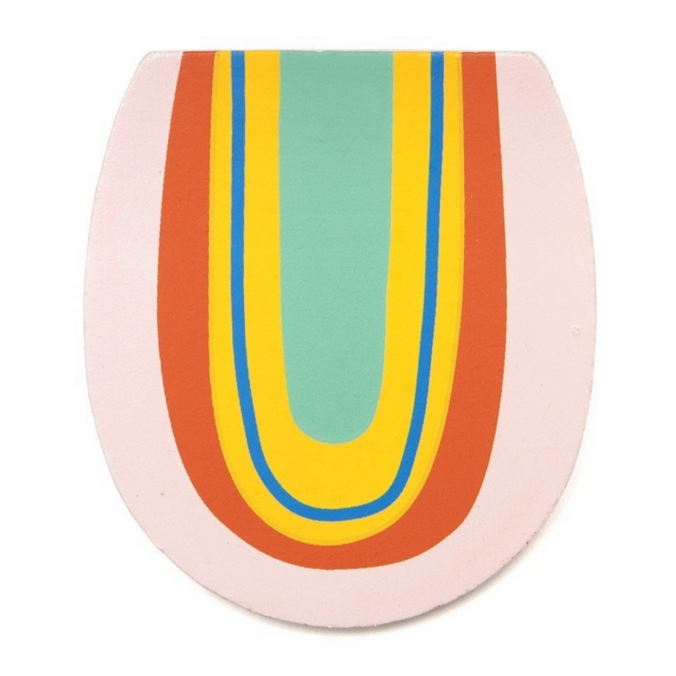 It is the letter U. It is a thin piece of wood, pink red yellow blue and teal and looks like a rainbow. By Suzy Ultman
