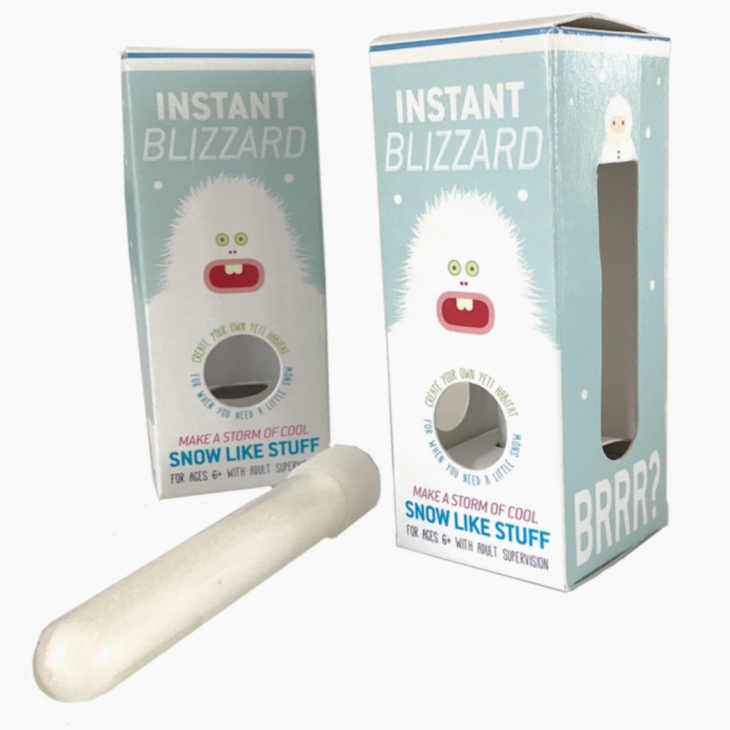 a tube of instant snow and two empty boxes of instant blizzard