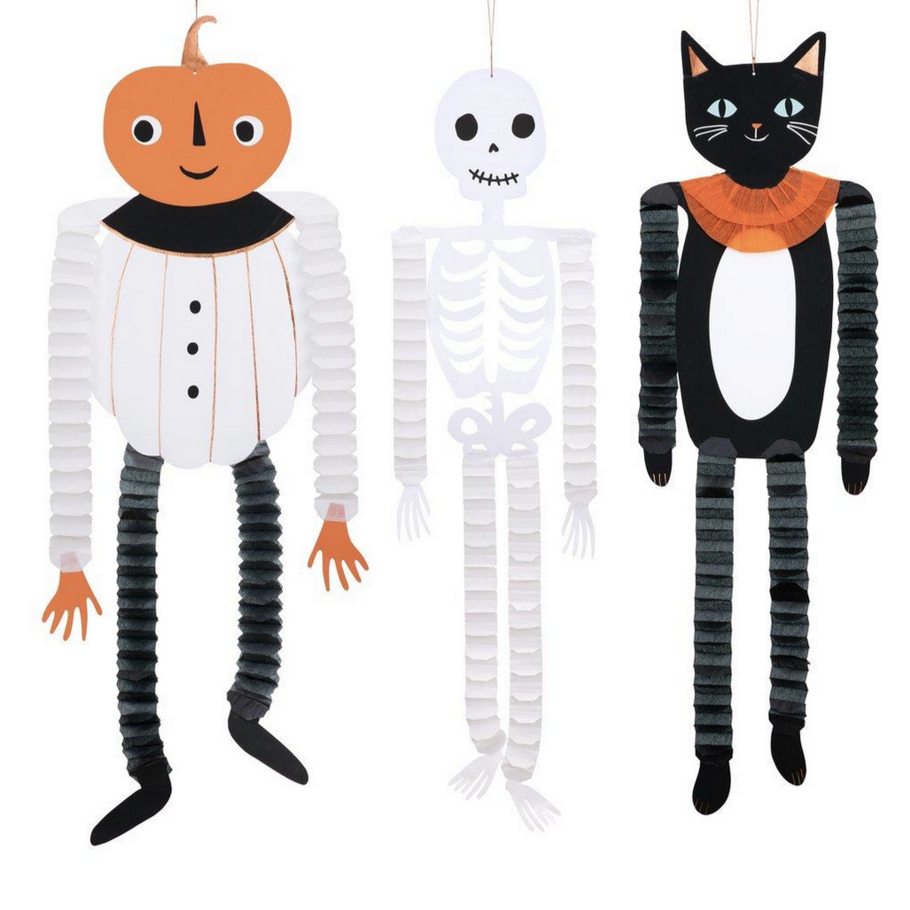A set of three Halloween garland decorations featuring a skeleton, a black cat, and a pumpkin, each with honeycomb legs and arms, and dressed in white, black, and orange colors respectively.