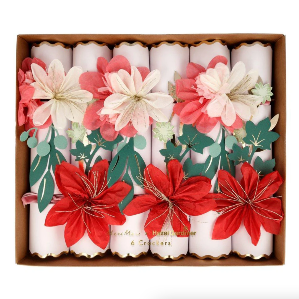 A box of six floral design crackers with gold foil details and pink velvet ribbons.