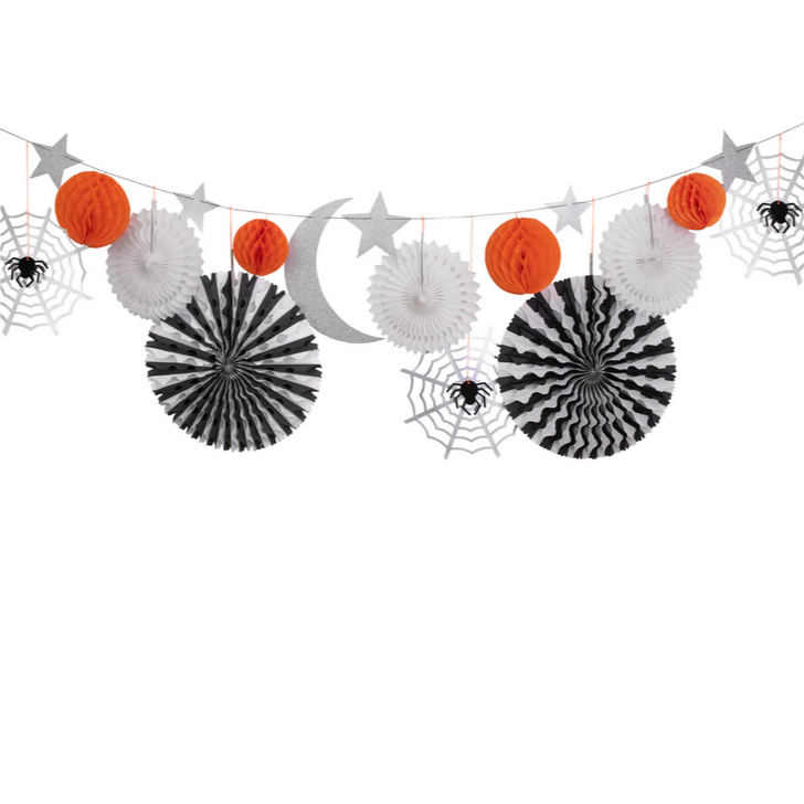 A Halloween garland featuring black and white pinwheels, orange honeycomb balls, silver foil cobwebs, glittered spiders, a glittered crescent moon, and glittered stars, all strung together with black and white baker's twine.