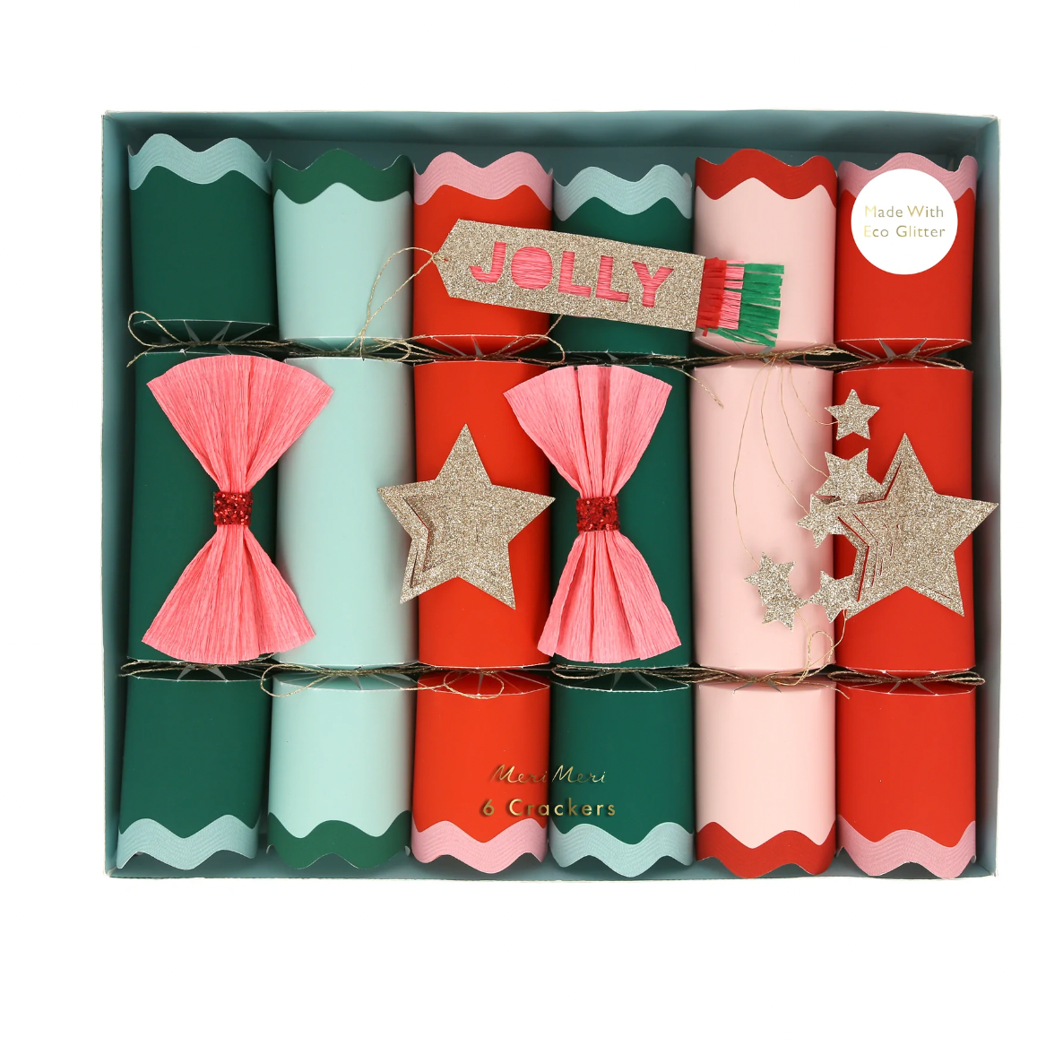 A set of Christmas crackers with crepe paper decorations in red, green, and pink, each featuring a wave pattern border and adorned with bows and glittery embellishments. The set is presented in a box.