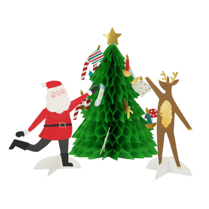 A 3D card designed to look like a decorated Christmas tree with Santa Claus and a reindeer. The card is green with gold foil accents and has images of stockings, a star, and the text 'Merry Christmas'.