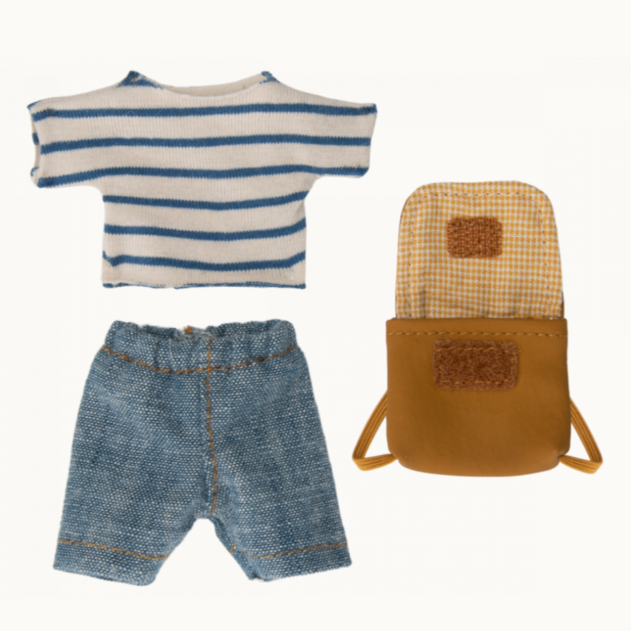 A set of clothes for a small toy figure, including a striped t-shirt, blue shorts, and a brown backpack.