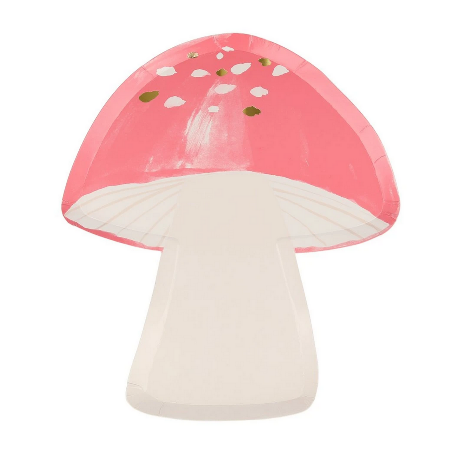 A toadstool-shaped paper plate with a pink top, white stem, and green dots on the top plate, with a plain white back.
