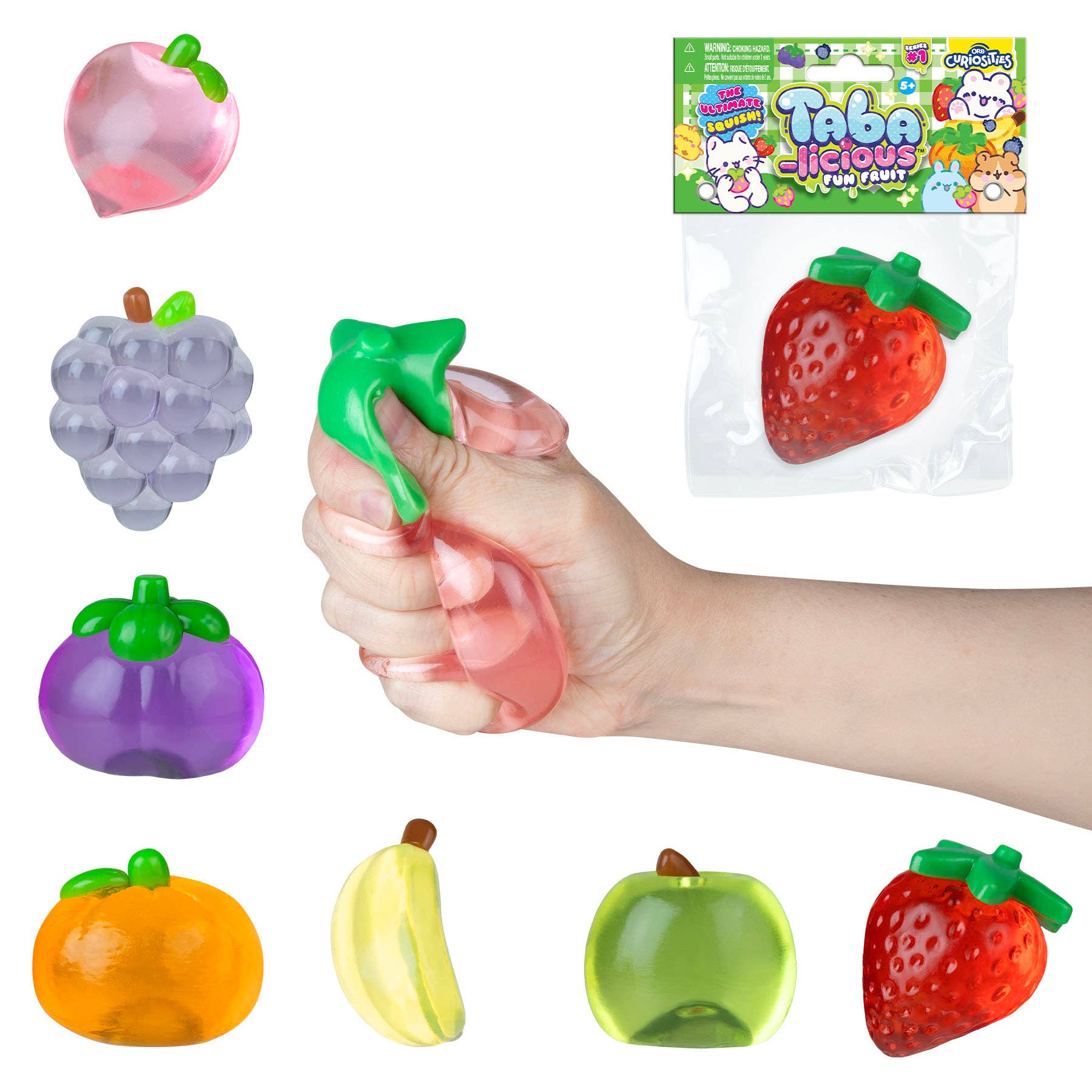 Set of colorful fruit-shaped squishies with a hand holding a pink one, and packaging in the background.