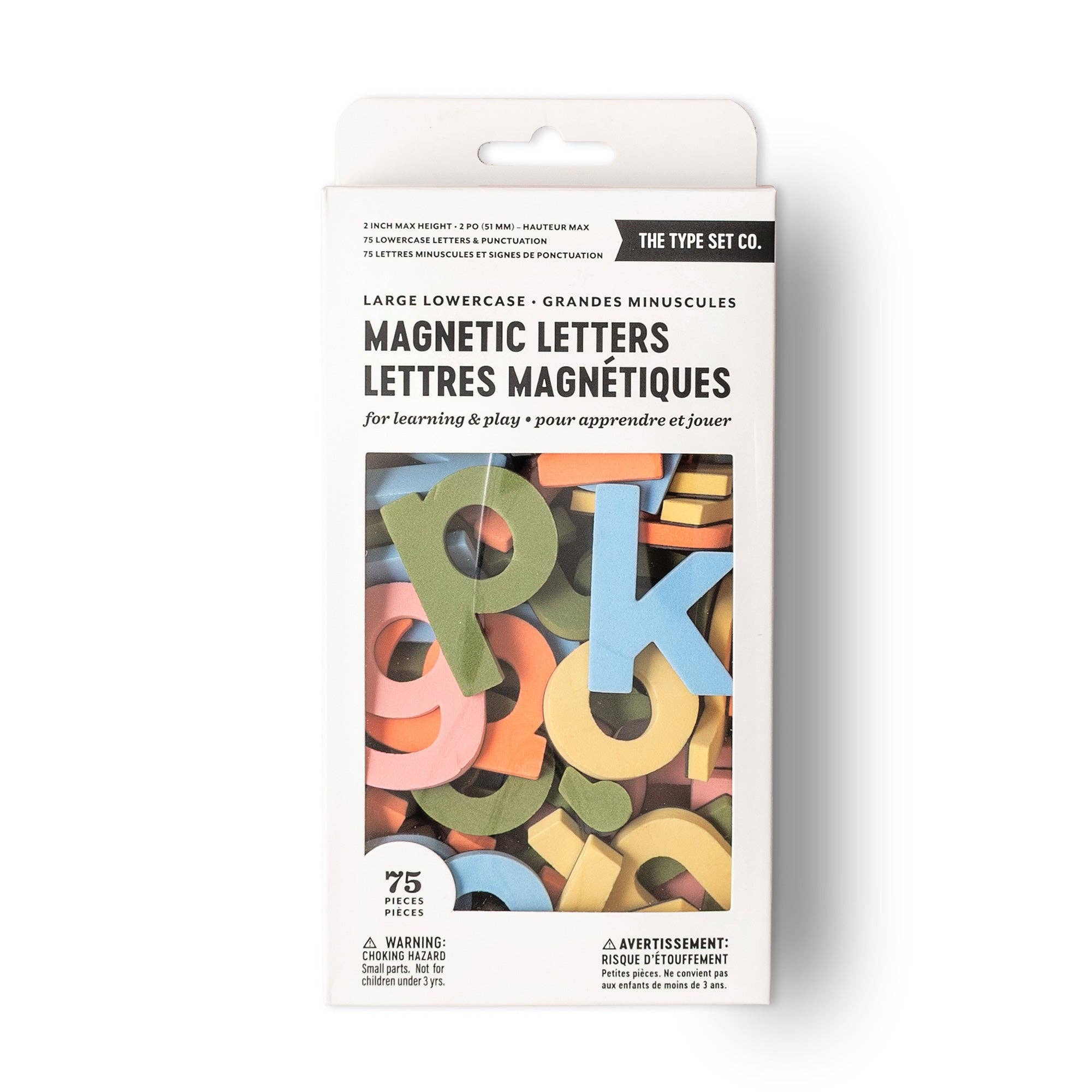 Box of colorful magnetic letters on a white background