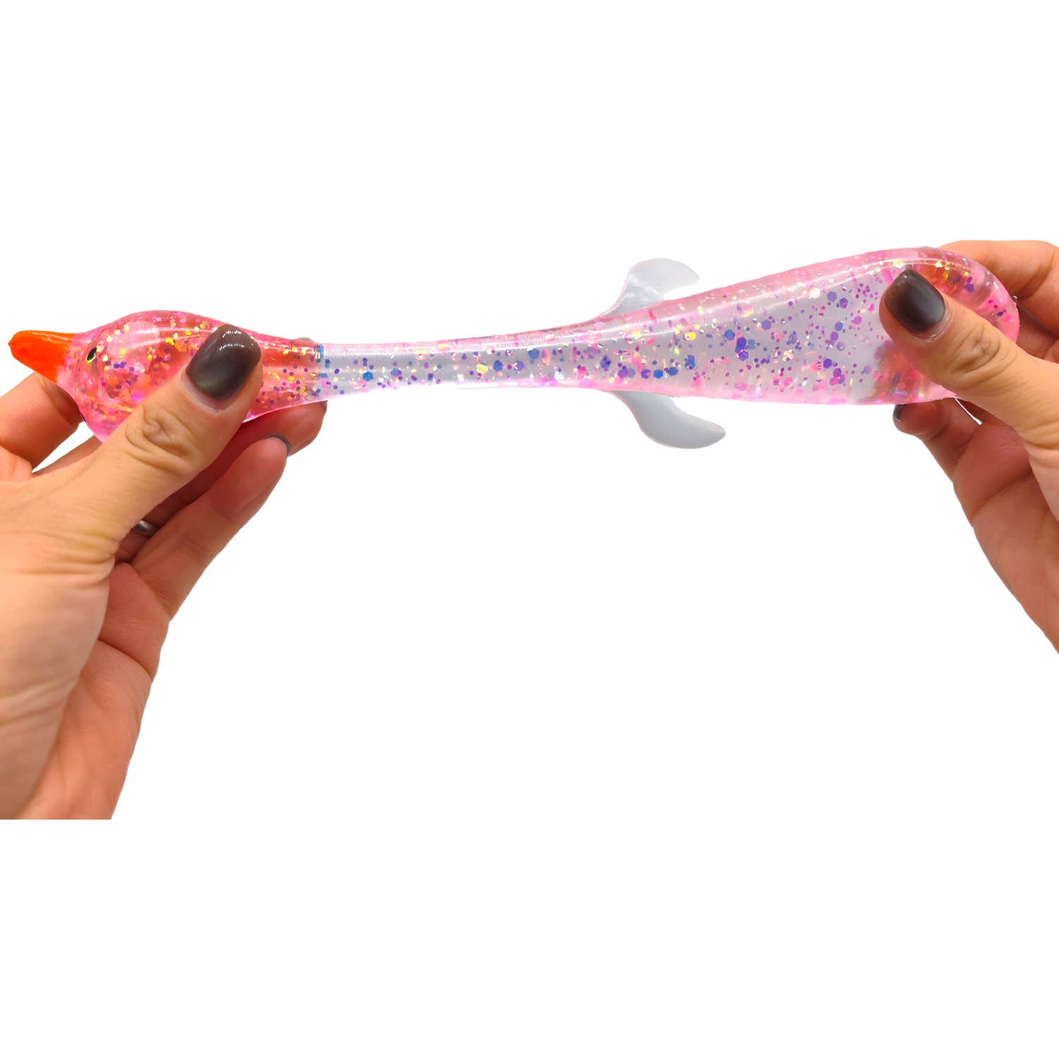 Hand holding a colorful glittery object against a white background
