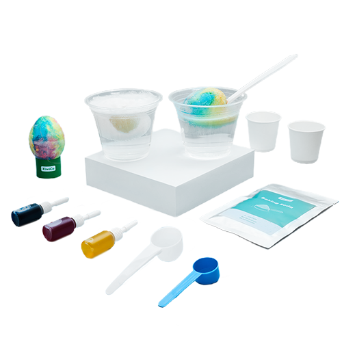 Set of egg art supplies including cups, bottles, and a box on a white background