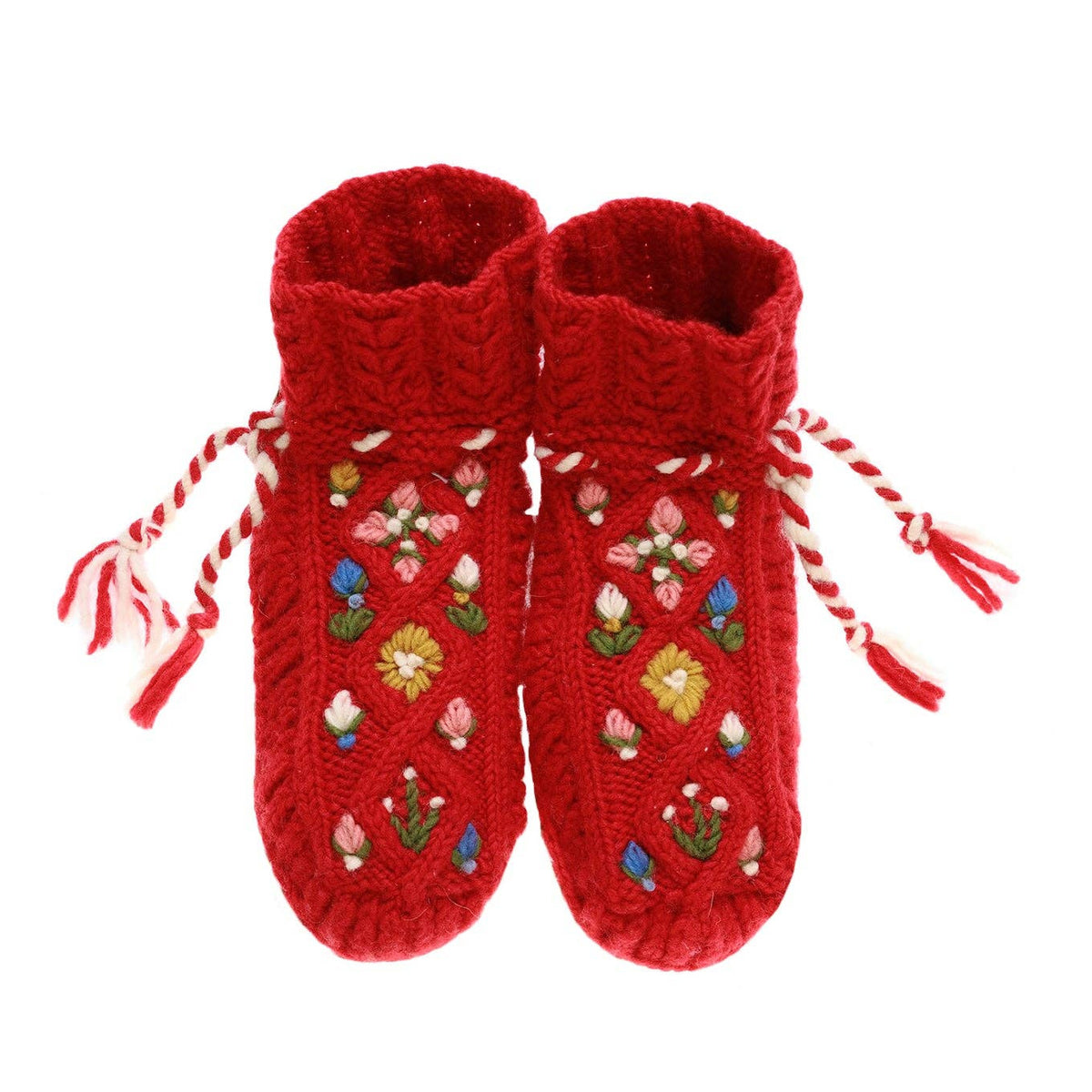 Red knitted baby booties with floral patterns on a white background