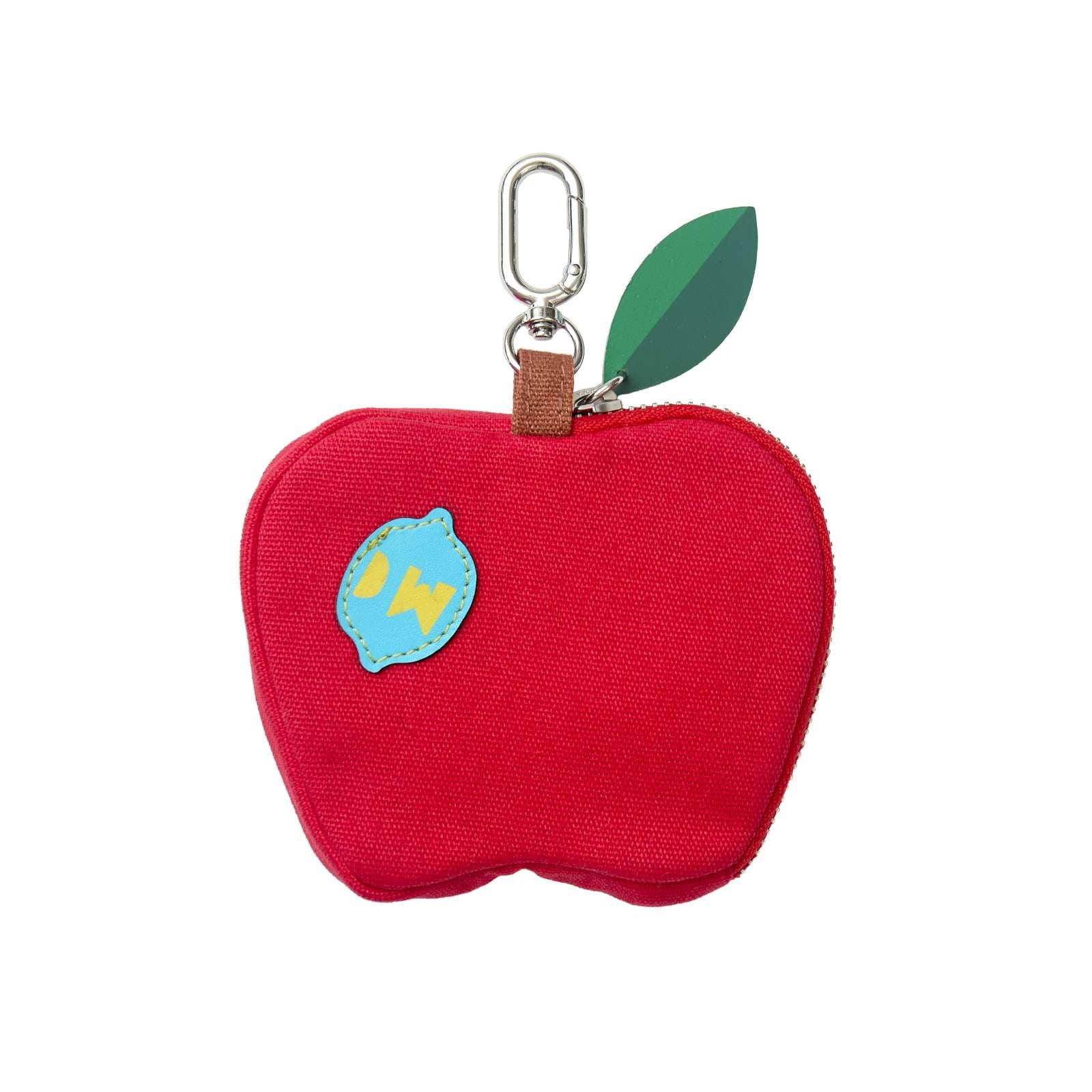 Red apple-shaped pouch with a keychain and leaf on a white background