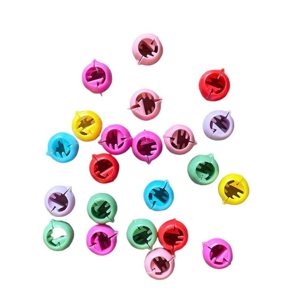 Colorful decorative beads on a white background