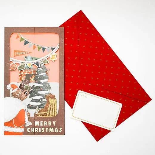 Christmas card with a red envelope on a white background