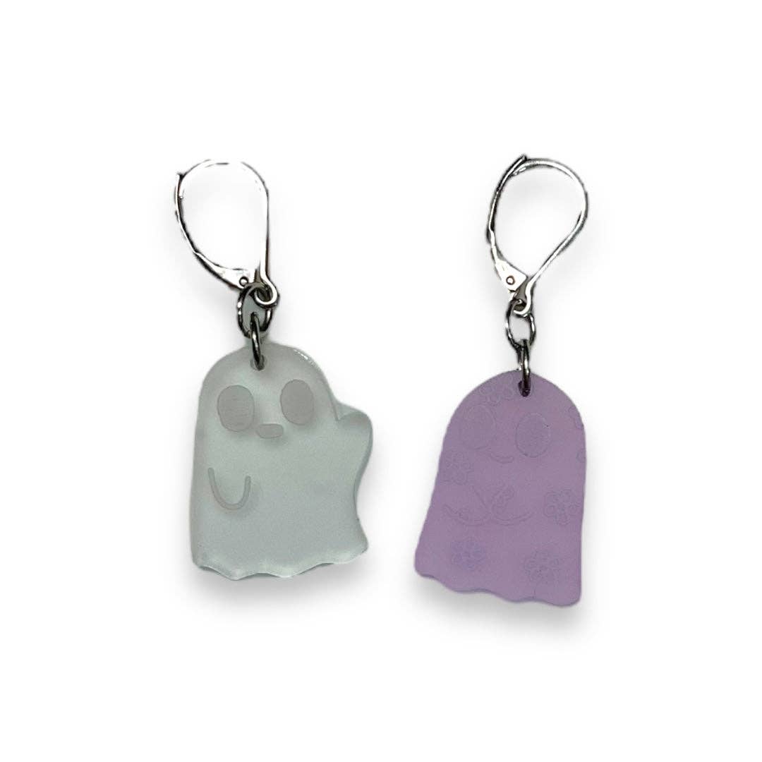 Ghost-shaped earrings in light gray and purple on a white background