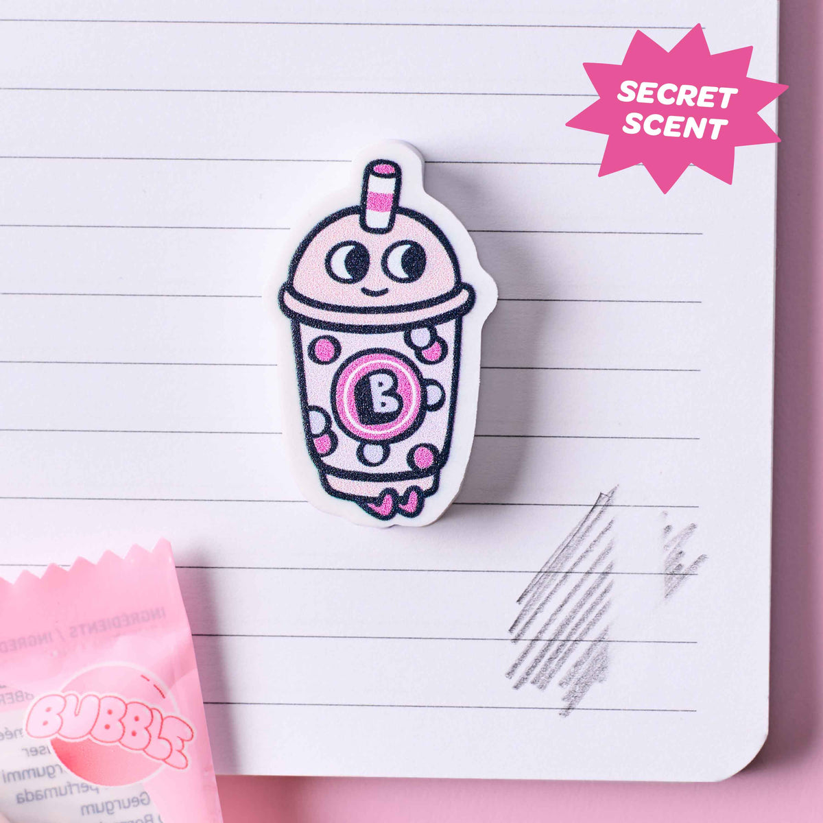 Sticker of a cartoon bubble tea cup with a 'B' on a lined notebook page, labeled 'Secret Scent'.
