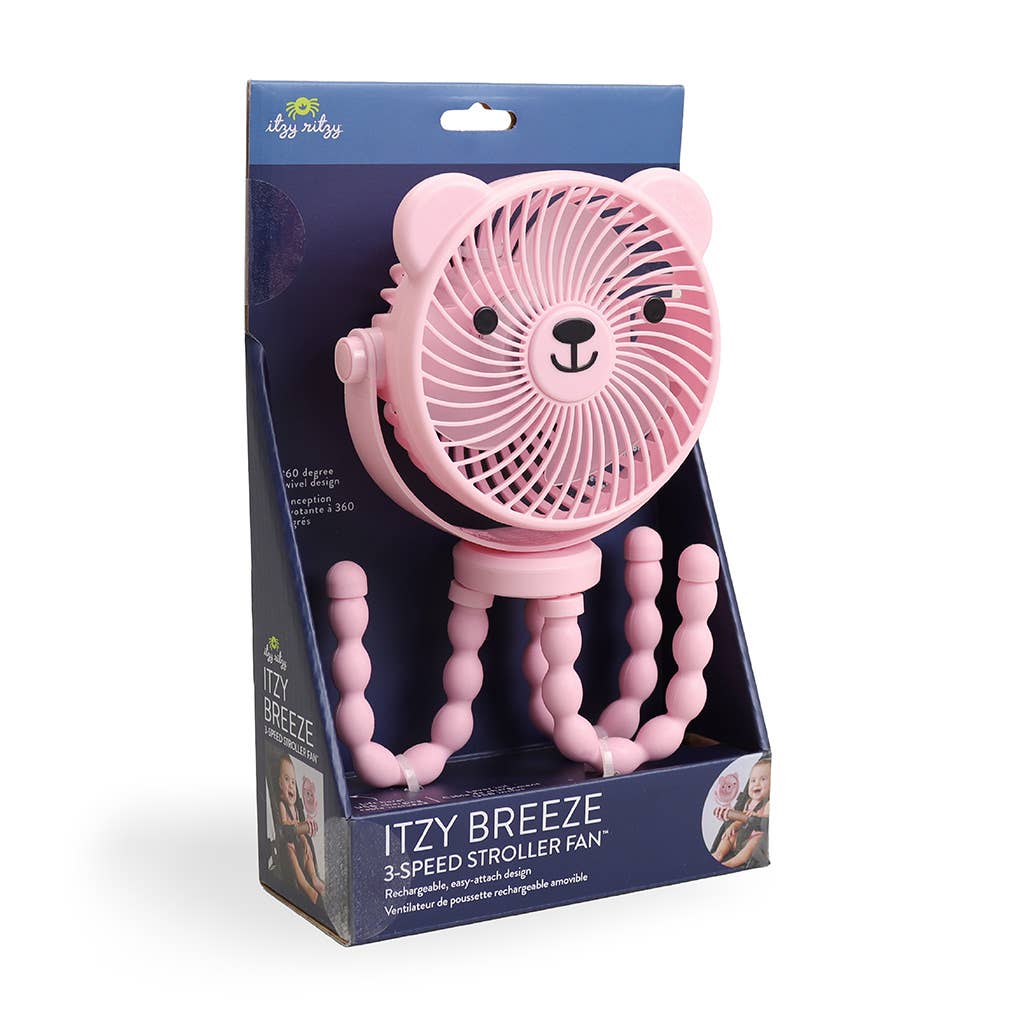 Pink lion-shaped fan in its packaging with 'Itzy Breeze' branding.