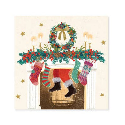 Christmas-themed card with stockings, wreath, and Santa Claus illustration on a white background.