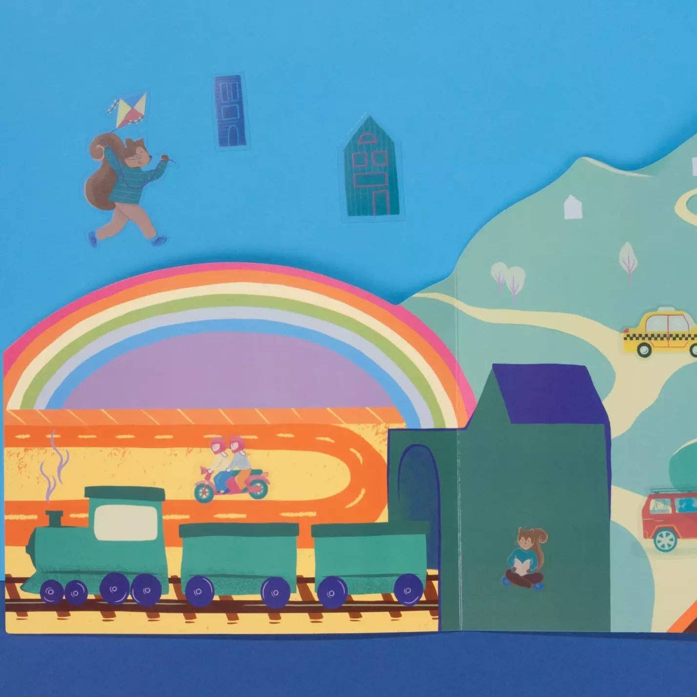 Children's illustration with a train, rainbow, and colorful scene on a blue background