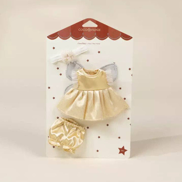 A toddler angel-themed clothing set by cocoonella, featuring a champagne gold satin dress, matching bloomers, and a white bow, all presented on a white backing card with a red scalloped top border.