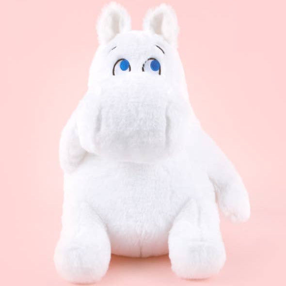 White plush toy with blue eyes on a pink background
