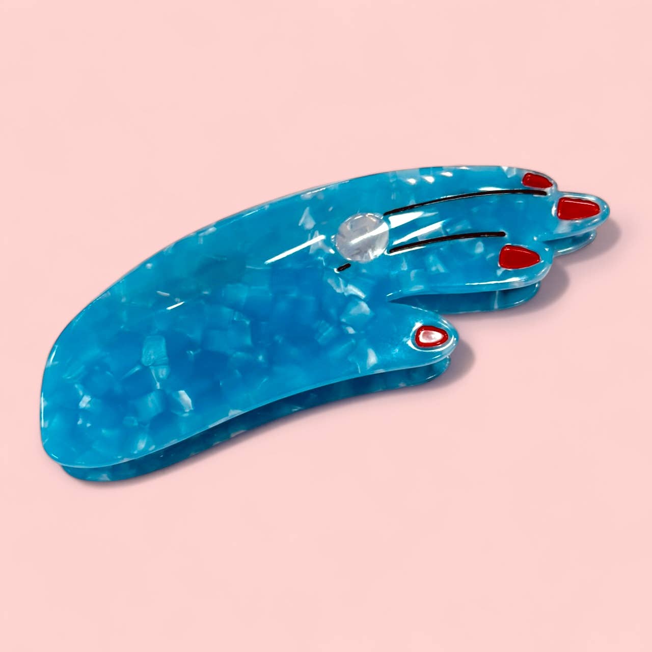 Blue hand hair claw with red nail details & white ring 