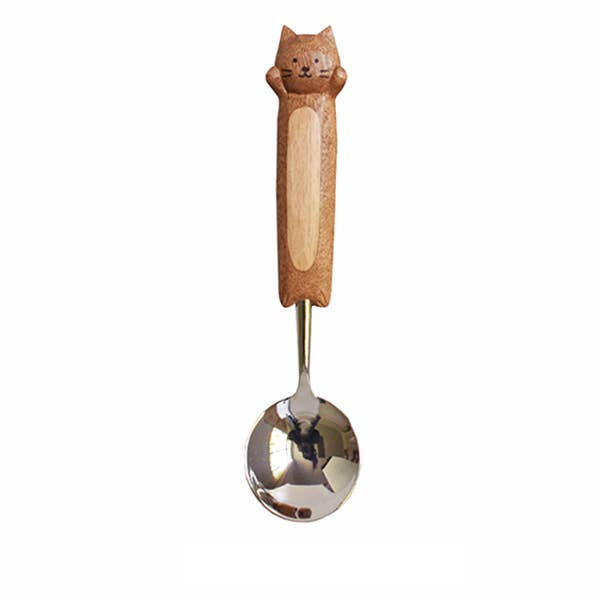 Spoon with a wooden handle shaped like a cat on a white background