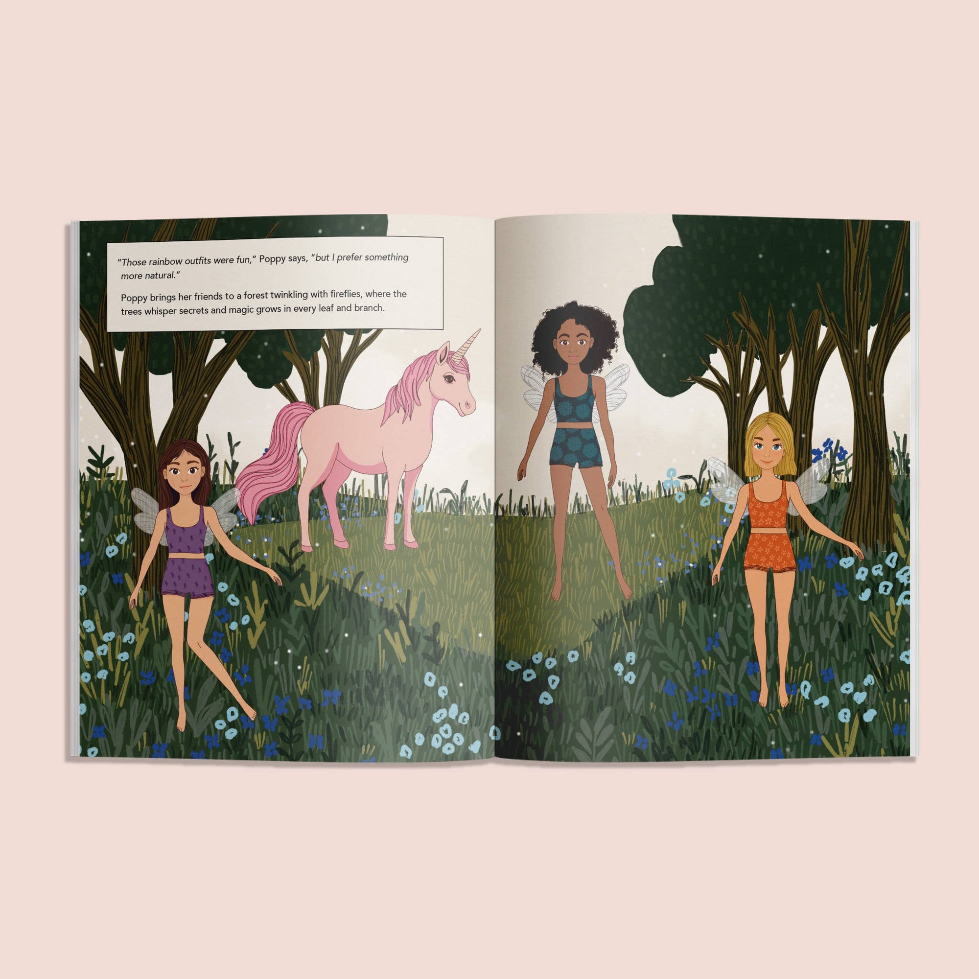 Illustrated book open to two pages showing a unicorn and children in a forest setting.