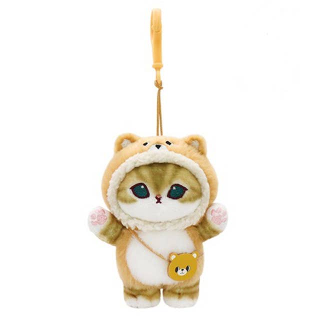 Plush keychain of a cat in a bear costume on a white background