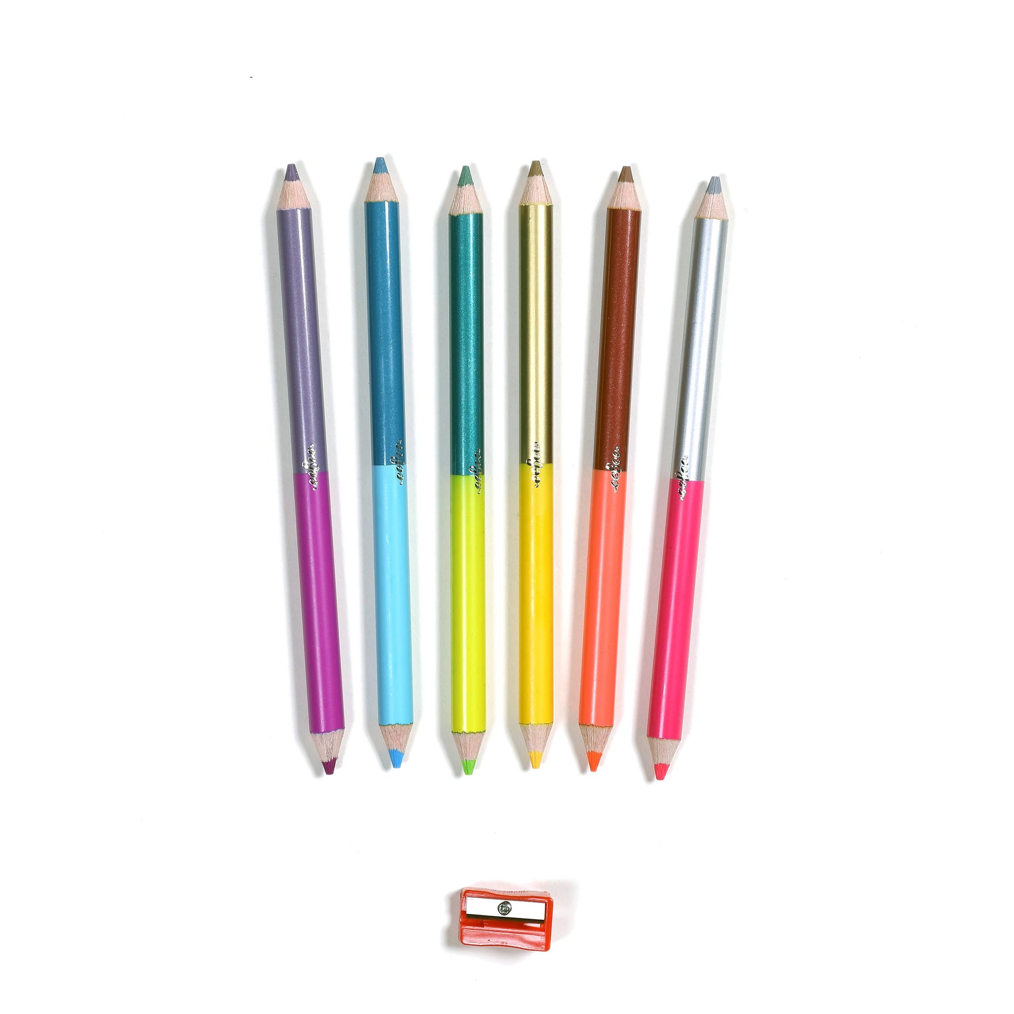 Set of colorful pens with a small orange pencil sharpener on a white background